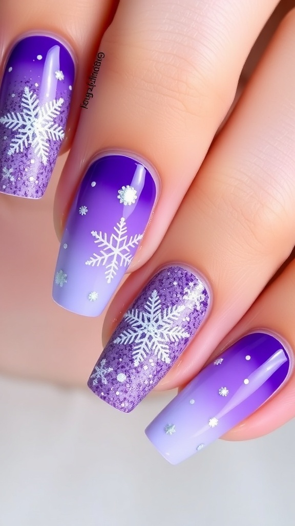 Close-up of purple Christmas nail art with snowflakes and glitter.